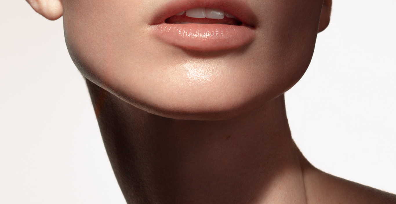 the bottom part of a woman's face showing her open mouth